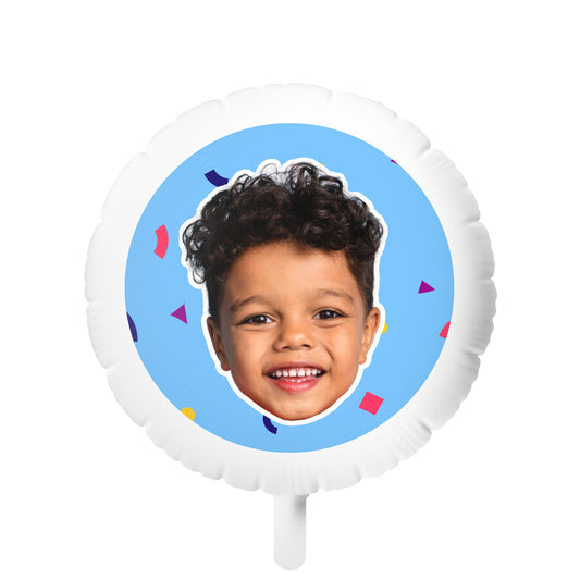 A custom face photo balloon featuring a single-sided white mylar design with a colorful background and a smiling child's face.
